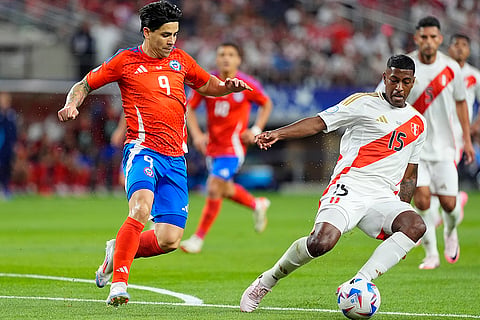 Miguel Araujo and Victor Davila battle for the ball 